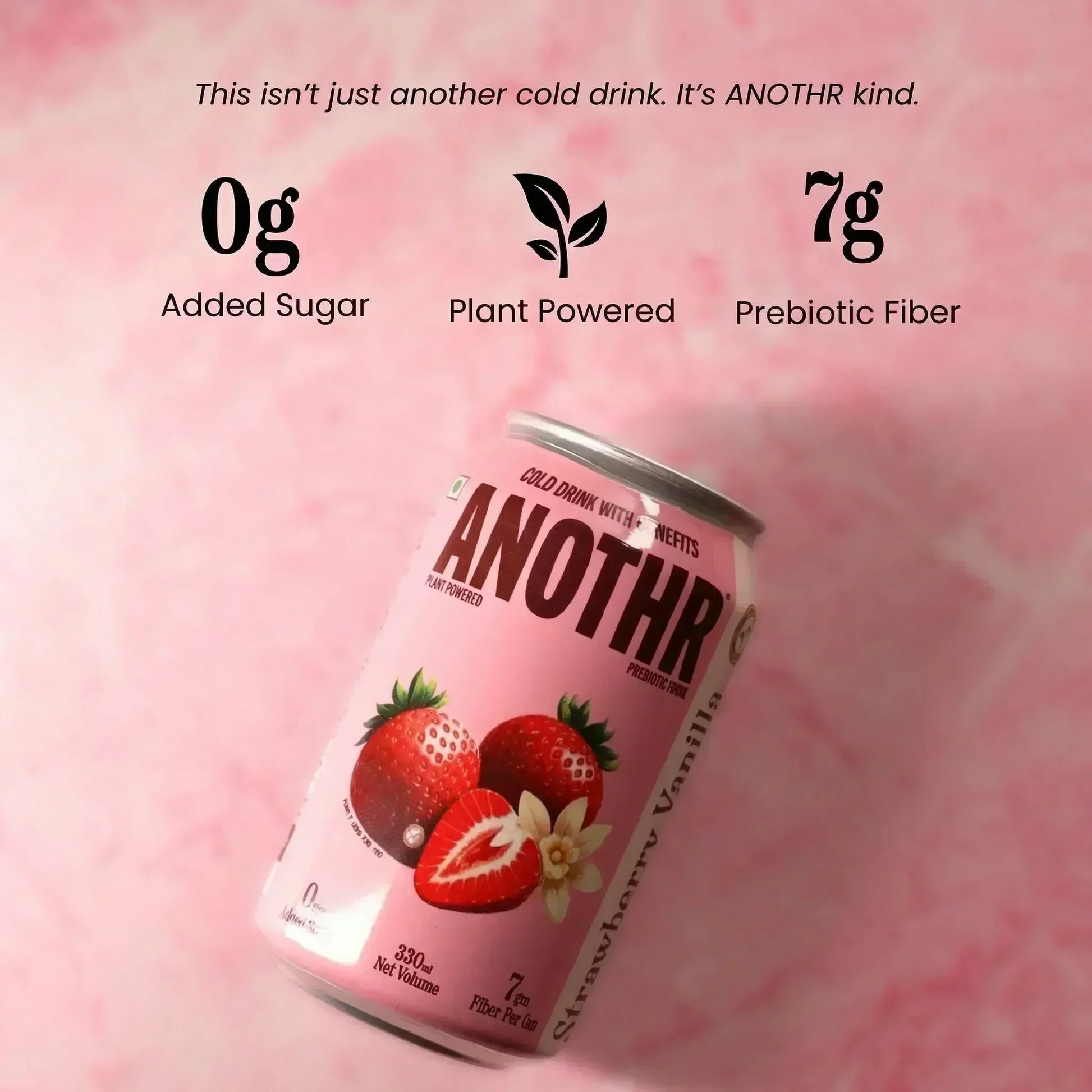 Pink can of 'ANOTHR Prebiotic Cold Drink' strawberry vanilla flavor soda with nutritional information on a pink background that says 0gm added sugar, plant powered and 7gm prebotic fiber