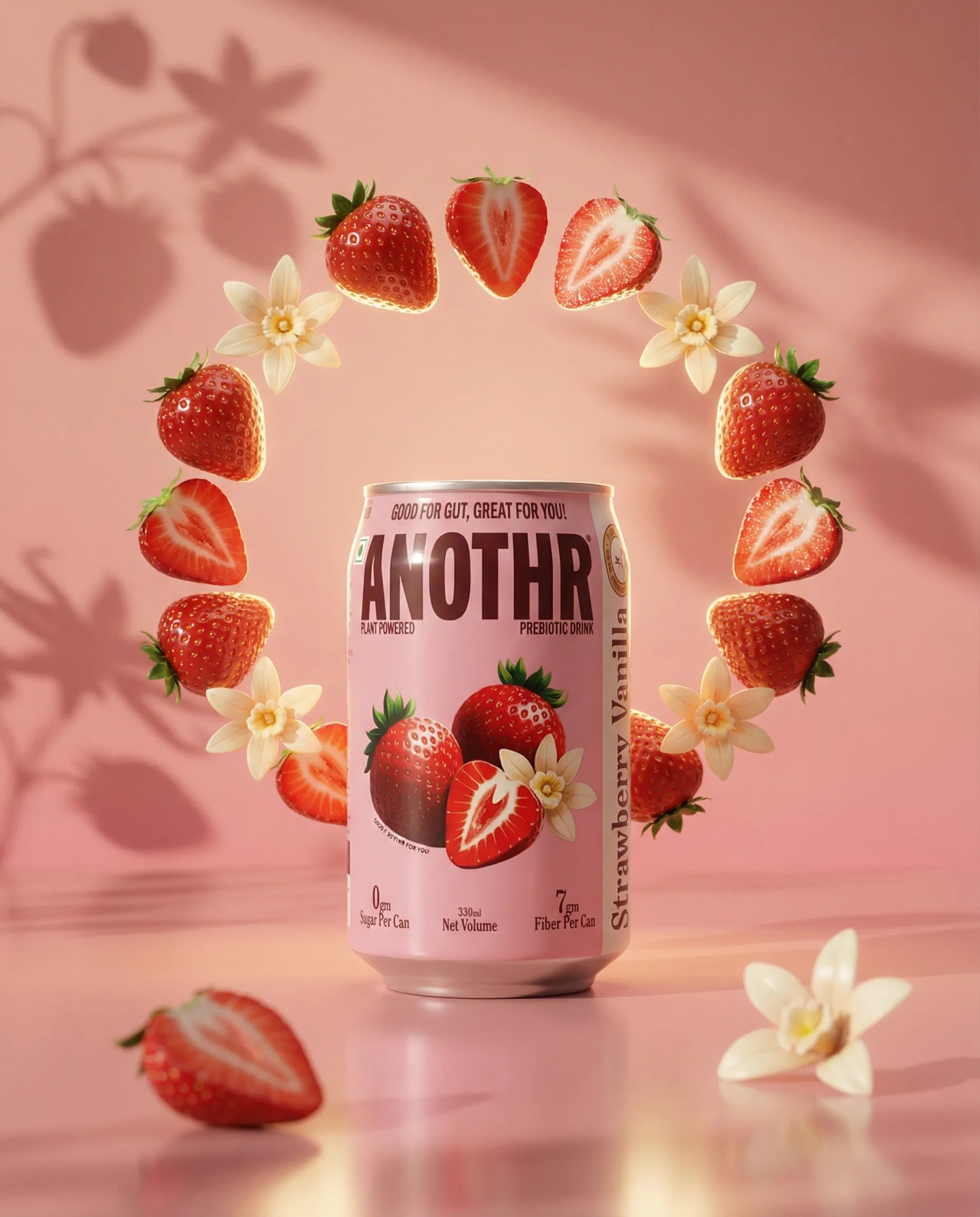 Pink can of 'ANOTHR' strawberry vanilla flavor with strawberries and flowers revolving it.
